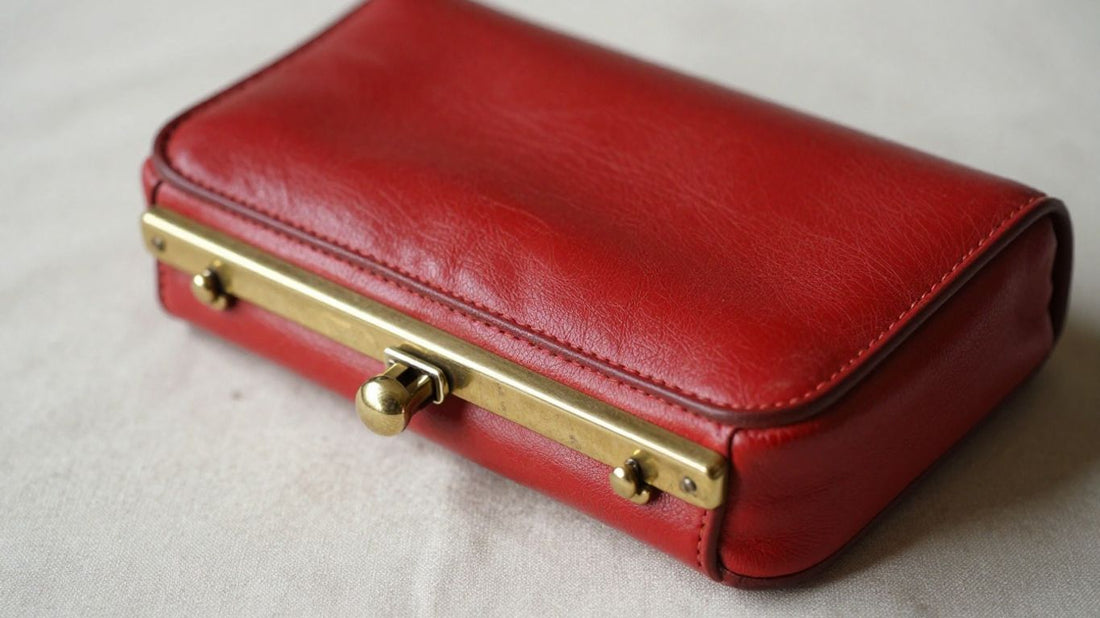 Vintage red purse with brass hardware