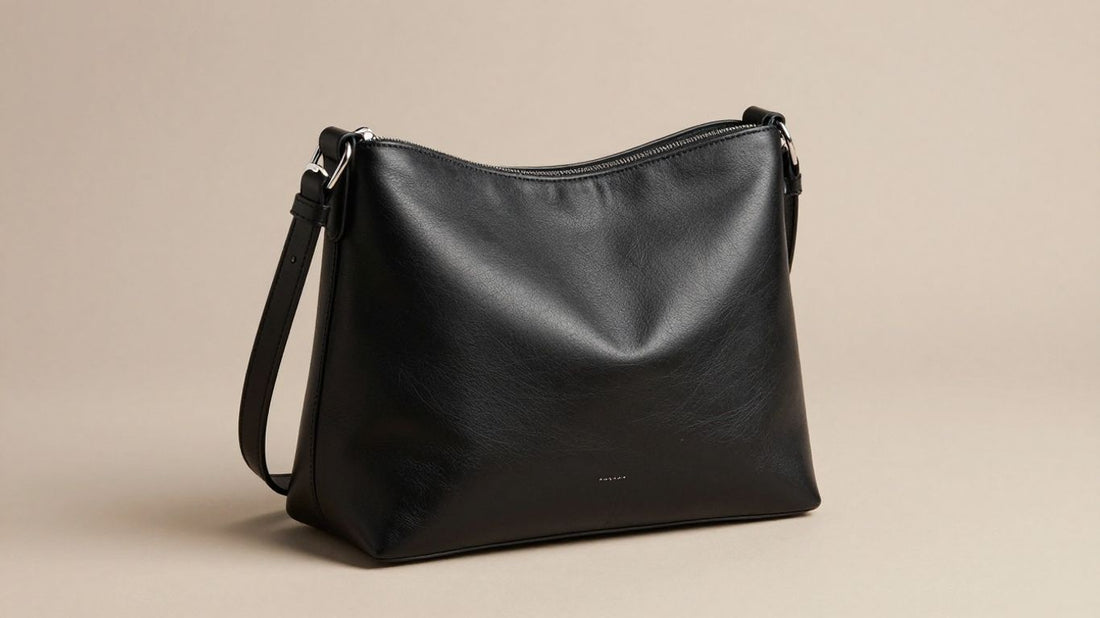 Small black shoulder bag with adjustable strap